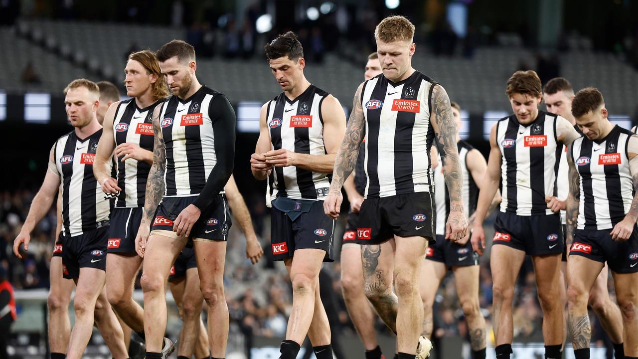 MELBOURNE, AUSTRALIA - JULY 28: The Magpies look dejected after a loss during the 2023 AFL Round 20 match between the Collingwood Magpies and the Carlton Blues at The Melbourne Cricket Ground on July 28, 2023 in Melbourne, Australia. (Photo by Michael Willson/AFL Photos via Getty Images)