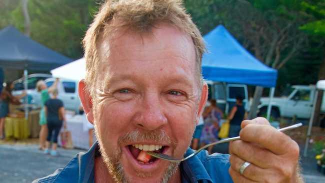 Organic Matters owner Mike Smith, coordinator of the 2016 'Feast In The Field' with a meal prepared by Leche Cafe. Picture: Debrah Novak