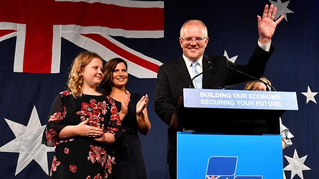 Australian Prime Minister Scott Morrison with wife Jenny and children Abbey (obscured) and Lily (left) after winning the 2019 Federal Election. (AAP Image/Mick Tsikas)