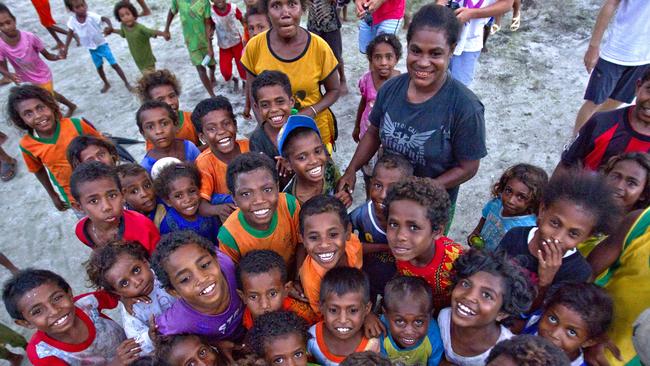 Meeting the locals on TropicSurf’s Secret Papua trip.