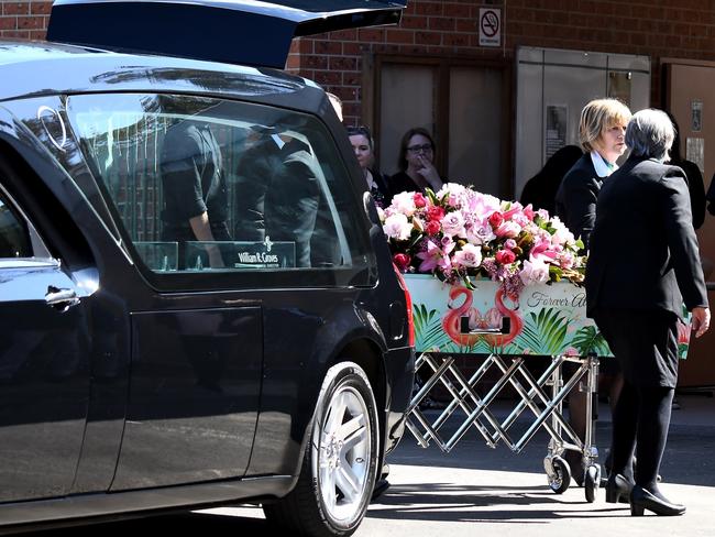 Lily’s casket, draped in flowers and decorated with flamingoes. Picture: BACKGRID via NCA NewsWire