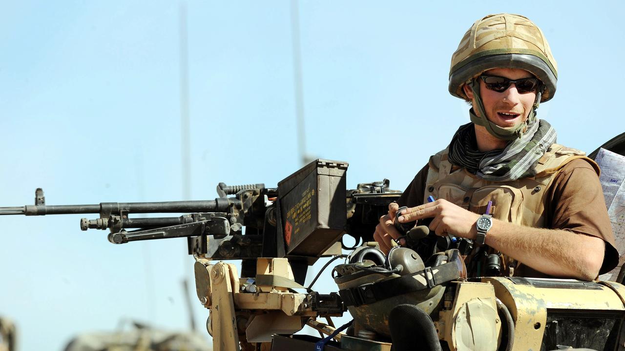 Prince Harry atop a military vehicle in the Helmand province, Southern Afghanistan in 2008.