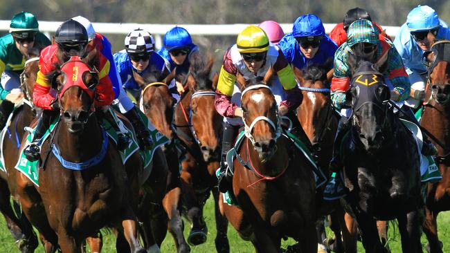 Loving home ridden by Tye Angland  (yellow cap, maroon with yellow armbands) wins race 1 during Scone  Races located in the Upper Hunter Region of NSW. The Bend . Pic Jenny Evans