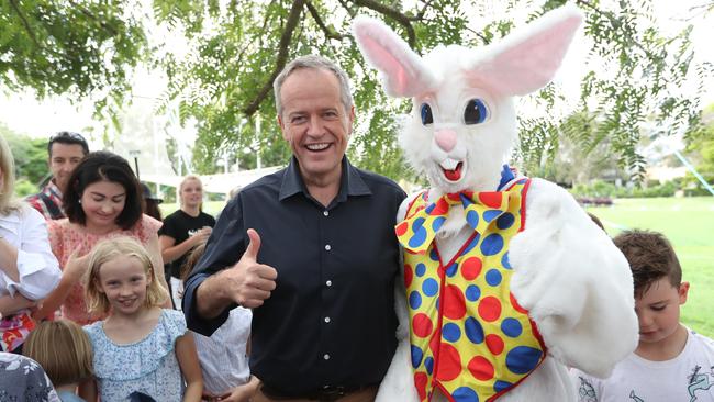 Bill Shorten with the Easter bunny, attending an Easter egg Hunt at Bulima Golf Club in Brisbane. Picture: Kym Smith