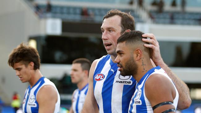 Todd Goldstein and Tarryn Thomas after another loss for the Kangaroos. Picture: Dylan Burns/AFL Photos via Getty Images