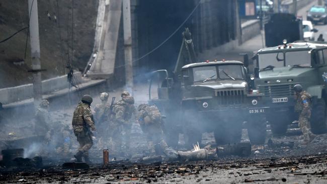 Ukrainian troops after a Russian raid in Kyiv. Picture: AFP