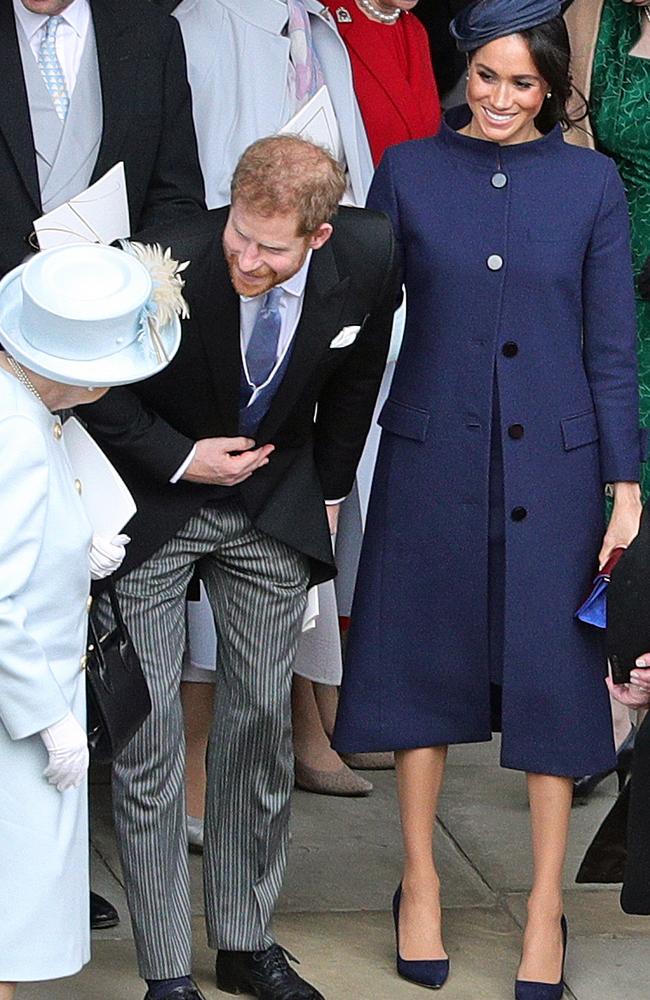 The Queen chats to Prince Harry and Meghan Markle at the wedding of Princess Eugenie and Jack Brooksbank. Picture: Aaron Chown/POOL/AFP)