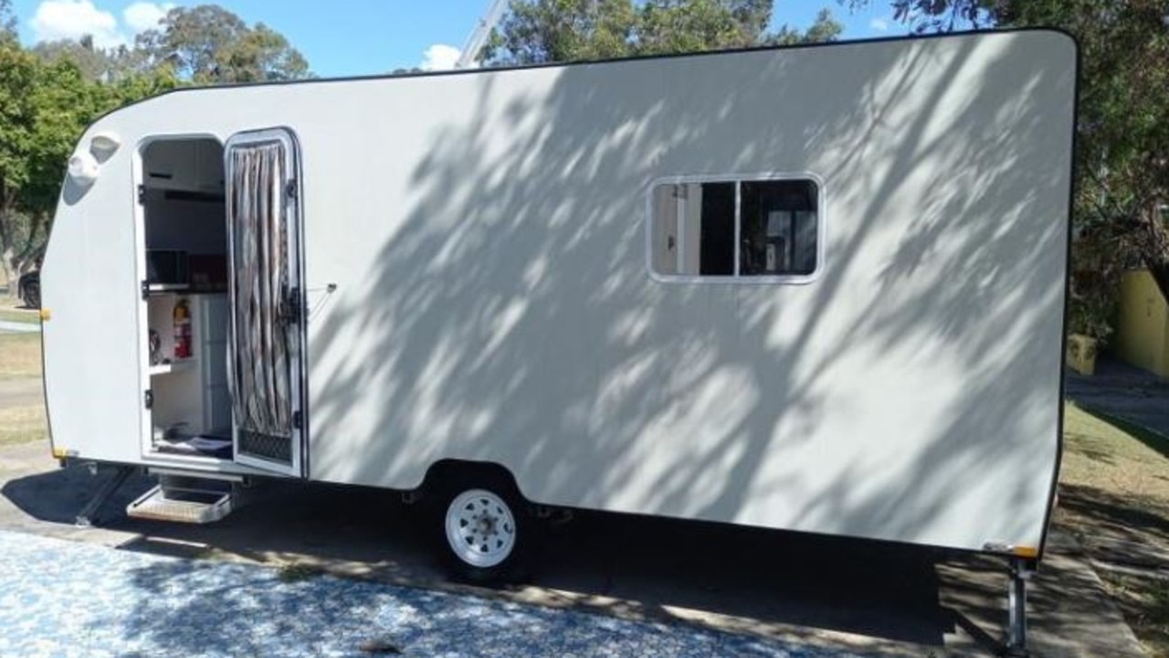 A 2015 Sunland Custom Caravan is listed at $14,625. It comes with a double bed, dining table, bench seats, cupboard, over head storage, bench top with sink and over and under storage, television, range hood, sunroof adjustable drop down corner leg stabilisers, jockey wheel, 50mm tow hitch, smoke alarm, water and electrical connectors