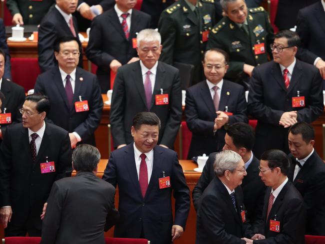 Xi Jinping waves as he leaves the 19th Communist Party Congress. Picture: Lintao Zhang/Getty Images