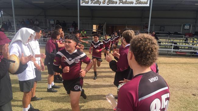 Marsden SHS boys run onto the field in Div 2 grand final.