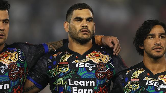 Andrew Fifita, Greg Inglis and Johnathan Thurston line up before the game during the NRL All Stars match this year. Pic: Ashley Feder/Getty Images