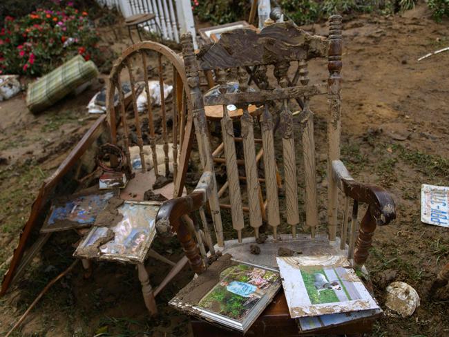 Keepsakes lay outside a home in Old Fort in the aftermath of Hurricane Helene. Picture: AFP