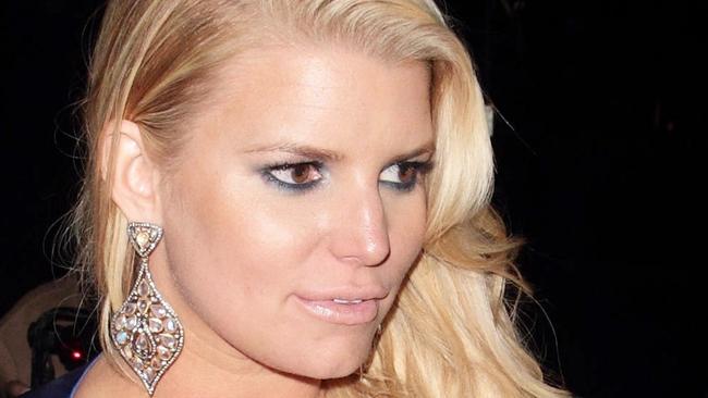 Jessica Simpson looks stunning in a blue evening gown while out in Beverly Hills.