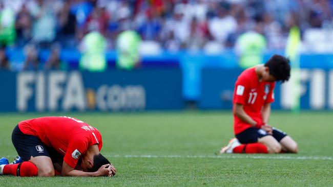 South Korea players react after defeating Germany. Picture: AFP.