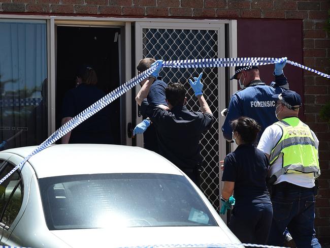 Police investigate the scene where a house was raided in Melbourne after an alleged plot to attack Melbourne's Flinders Street Station and Federation Square on Christmas Day was discovered.