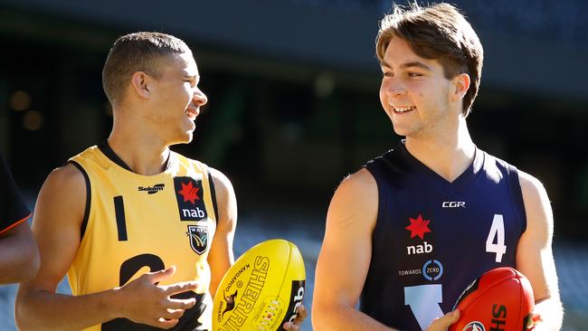 MELBOURNE, AUSTRALIA - JULY 02: Ian Hill of Western Australia (left) chats to Rhylee West of Vic Metro during the 2018 NAB AFL Under-18 Championships Press Conference at Etihad Stadium on July 2, 2018 in Melbourne, Australia. (Photo by Adam Trafford/AFL Media/Getty Images)