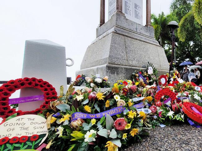 Wreaths lay on the cenotaph at the conclusion of the Anzac Day commemoration service on the Cairns Esplanade. Picture: Brendan Radke