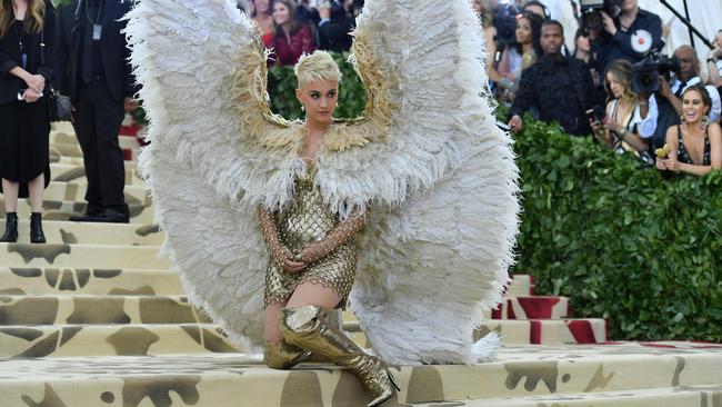 While she may have looked out of this world, Katy Perry’s outfit lost some of its majesty when videos emerged of her having to awkwardly sidestep through doorways throughout the evening. Picture: Getty.