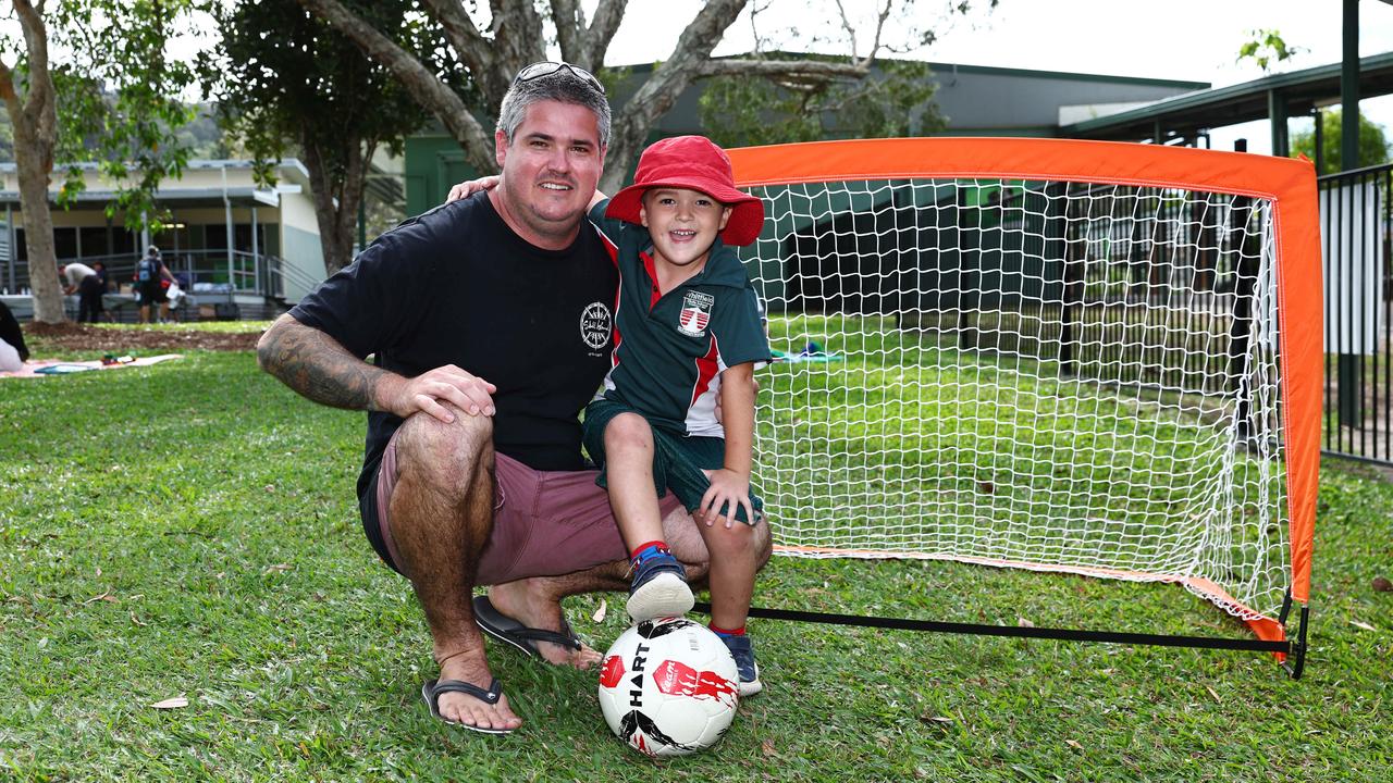 Tayler Kelly with his son Levi Kelly, 5, at the Whitfield State School Father's Day activity afternoon. Picture: Brendan Radke