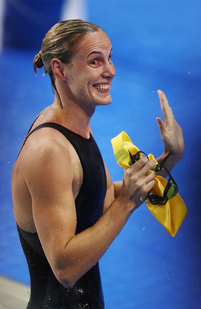 Bronte Campbell looks almost sheepish as she celebrates victory in the women's 100m freestyle . Picture: Hannah Peters/Getty Images