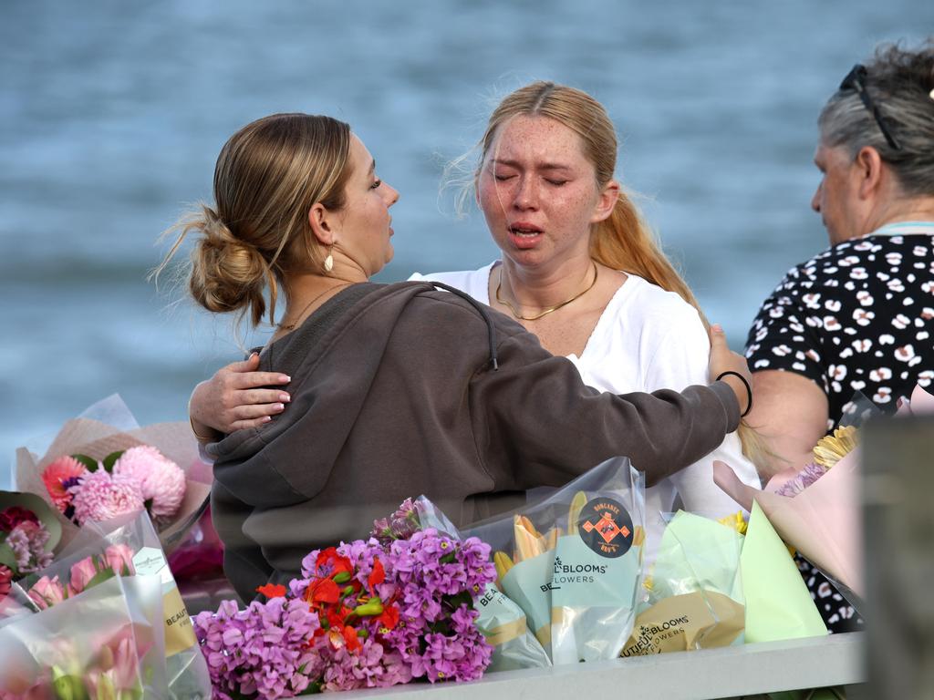 Hundreds of people have gathered at Bribie Island for a vigil to honour 17-year-old shark attack victim Charlize Zmuda. Picture: David Clark