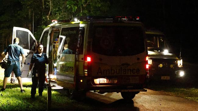 Police officers and QAS paramedics attend an emergency scene at the Crystal Cascades swimming hole in the Redlynch Valley, where 2 men aged 21 and 59 drowned on Tuesday afternoon. Picture: Brendan Radke