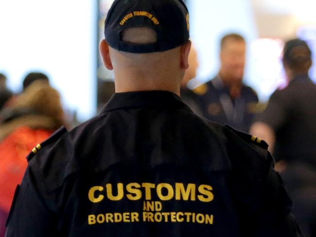 FOR WEEKEND AUSTRALIAN MAGAZINE Australian Customs and Border Protection Service at Melbourne Airport.- Counter Terrorism Officer Nihat, keeps an eye on departing passengers.