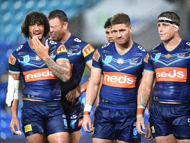 Titans players are dejected following a Raiders try during the Round 1 NRL match between the Gold Coast Titans and the Canberra Raiders at CBus Super Stadium on the Gold Coast, Sunday, March 17, 2019. (AAP Image/Dave Hunt) NO ARCHIVING, EDITORIAL USE ONLY