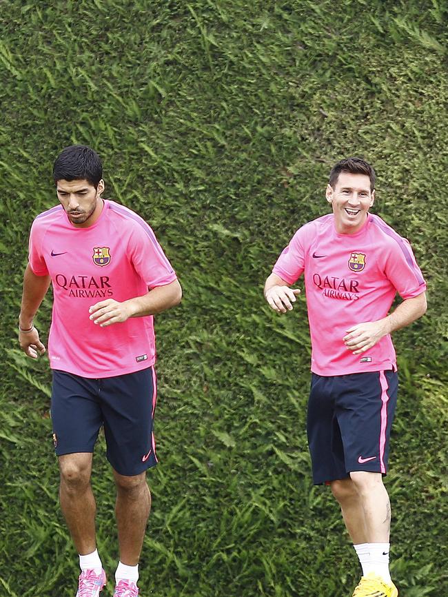 Suarez with his new teammate, Messi.