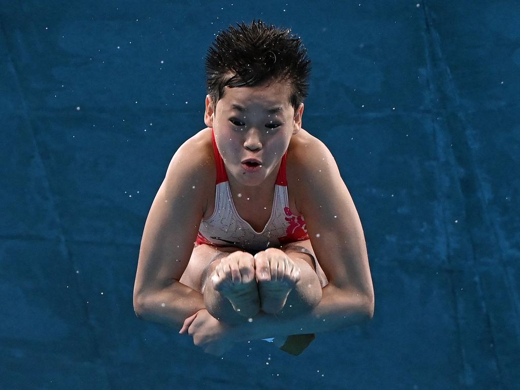 China's Quan Hongchan competes in the women's 10m platform diving final. Picture: Attila Kisbenedek / AFP