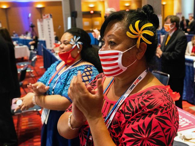 Delegates listen as President Donald Trump speaks during the first day of the Republican National Convention in Charlotte, North Carolina. Picture: AFP