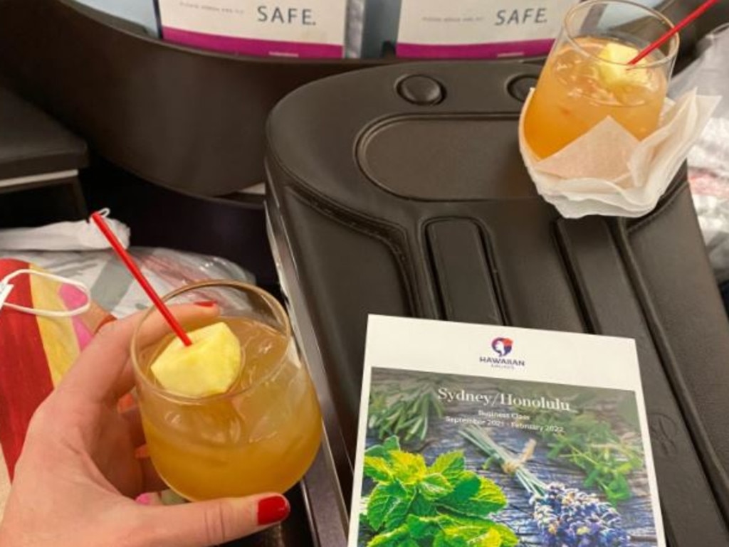 A welcome drink and an in-flight menu. Gosh we've missed this. Picture: Simone Mitchell