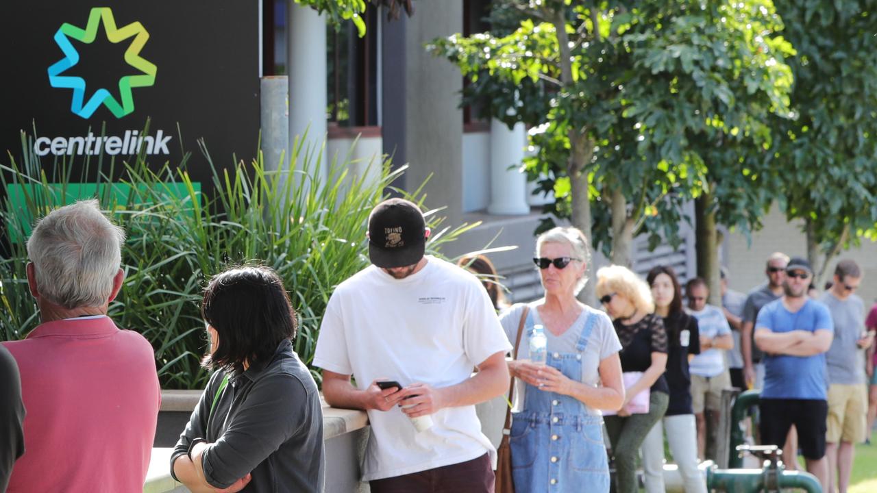 There were long queues outside of Centrelink when JobKeeper was announced. Picture Glenn Hampson