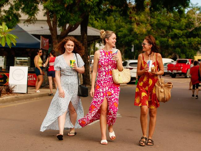 Frocking up for a return to the parap markets are from R Renael Carolin, Megan Horner and Holly Parker.Picture GLENN CAMPBELL