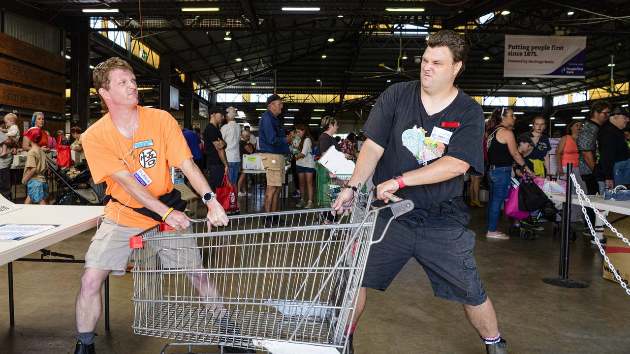 Longtime Lifeline volunteers and Bookfest trolley boys Jeremey Whitnall (left) and Matthew Tew at The Chronicle Lifeline Bookfest at Toowoomba Showgrounds, Saturday, March 1, 2025. Picture: Kevin Farmer