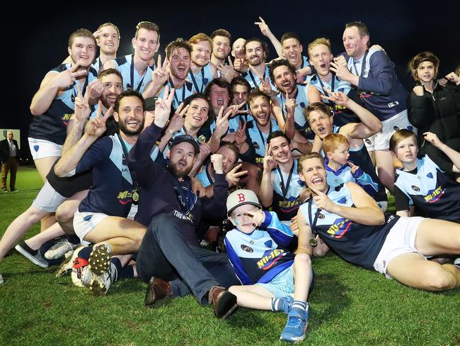 Lindisfarne celebrate winning the Southern Football League Grand Final against Huonville at North Hobart Oval. Picture: NIKKI DAVIS-JONES