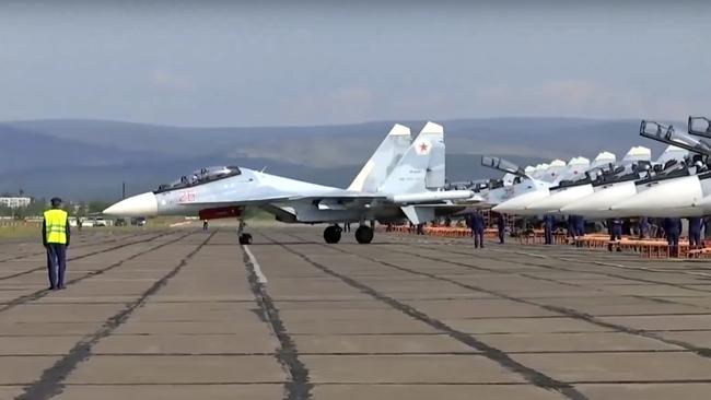 A Russian aircraft prepares to take off during the military exercises. Russia’s military chief of staff says that the exercises will involve 1000 aircraft, helicopters and drones. Picture: Russian Defence Ministry via AP