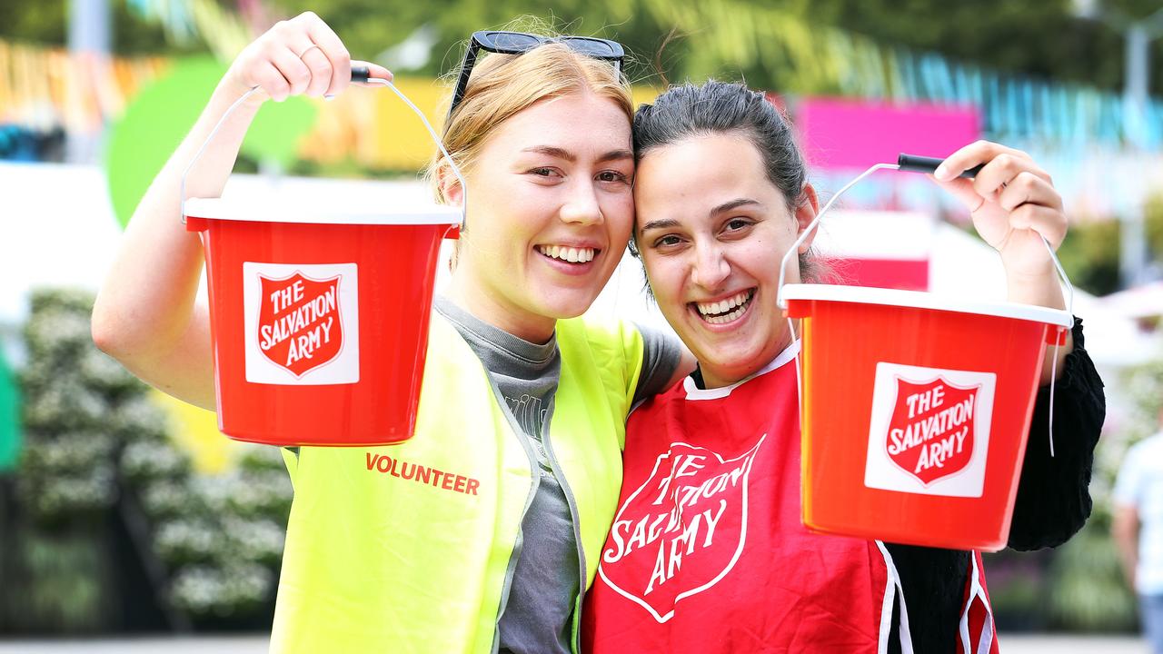 Salvation Army volunteers Keira Maddox and Amelia Natoli at the Taste of Tasmania collect donations for fire victims. Picture: ZAK SIMMONDS