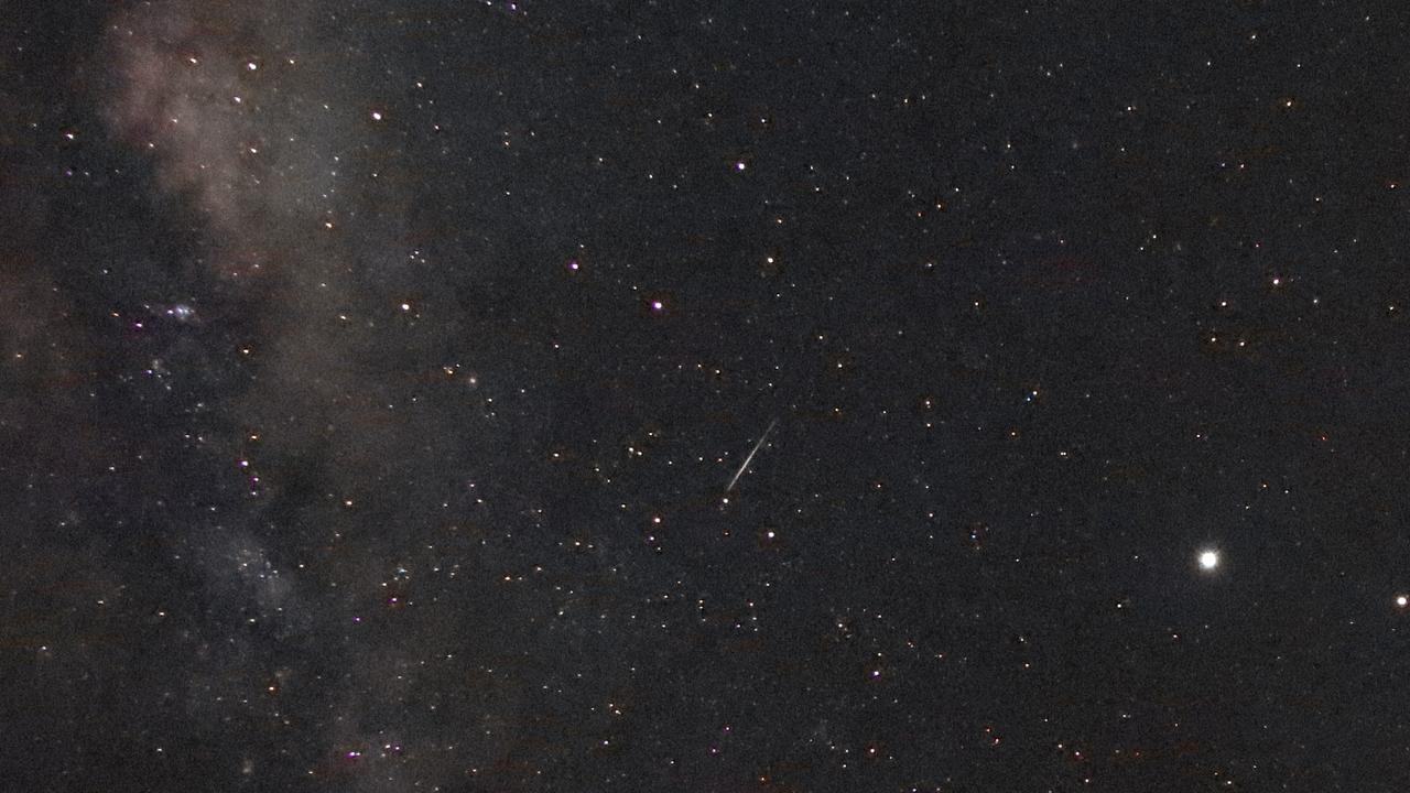 This image of the Eta Aquariid Meteor Shower shows the streak of a meteor next to the Milky Way over Dubbo, Australia. Picture: Dubbo Observatory