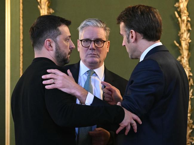 (L-R) Ukraine's President Volodymyr Zelensky, Britain's Prime Minister Keir Starmer and France's President Emmanuel Macron hold a meeting during a summit at Lancaster House. Picture: Getty Images