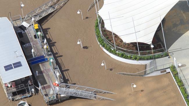 January 2011: Aftermath from Queensland floods at Eagle Street Pier. Picture: Bruce Long