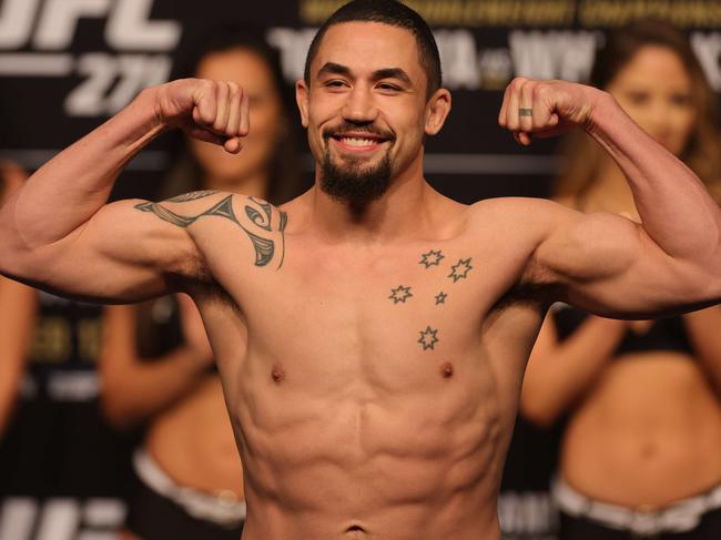 HOUSTON, TEXAS - FEBRUARY 11: Robert Whittaker of Australia weighs in prior to UFC 271 at Toyota Center on February 11, 2022 in Houston, Texas.   Carmen Mandato/Getty Images/AFP == FOR NEWSPAPERS, INTERNET, TELCOS & TELEVISION USE ONLY ==