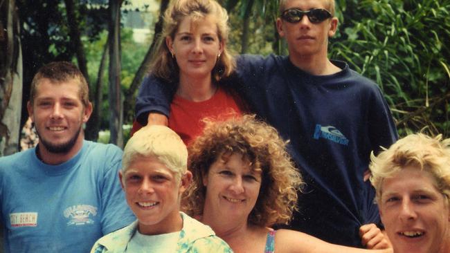 Mick Fanning (centre) with his family in the early ’90s. Picture: 'Surf for Your Life' Mick Fanning's autobiography