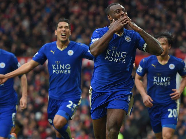 MANCHESTER, ENGLAND - MAY 01: Wes Morgan of Leicester City celebrates scoring his team's opening goal with team mates during the Barclays Premier League match between Manchester United and Leicester City at Old Trafford on May 1, 2016 in Manchester, England. (Photo by Michael Regan/Getty Images)