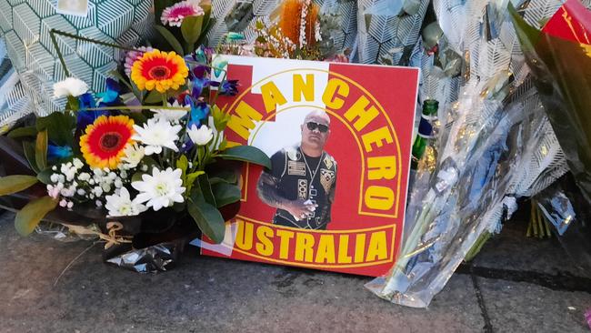 Flowers at the scene of the killing of Canberra Comanchero boss Pitasoni Ulavalu. Picture: Craig Dunlop