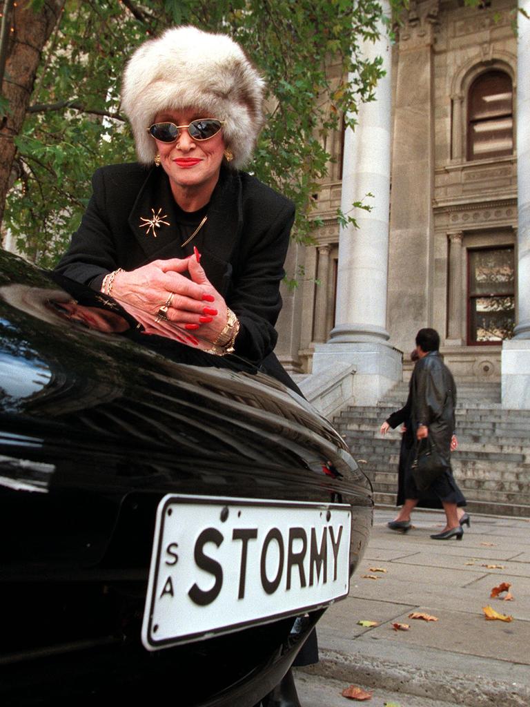 Stormy Summers standing next to her car outside Parliament House in 2000.