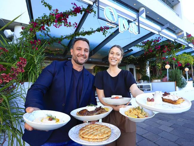 News story on the boom in great value banquets and set menus. Owner Michael Tassis and Zanni Lewis at Opa restaurant with their $60 banquet.