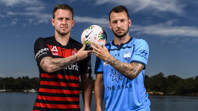 Simon Cox (left) will go head-to-head with Sydney FC striker Adam Le Fondre in Saturday’s derby. Picture: Darren Leigh Roberts