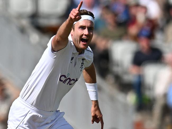 England's Stuart Broad celebrates after taking his 600th wicket, that of Australia's Travis Head, on the opening day of the fourth Ashes Test at Old Trafford. Picture: Oli Scarff/AFP