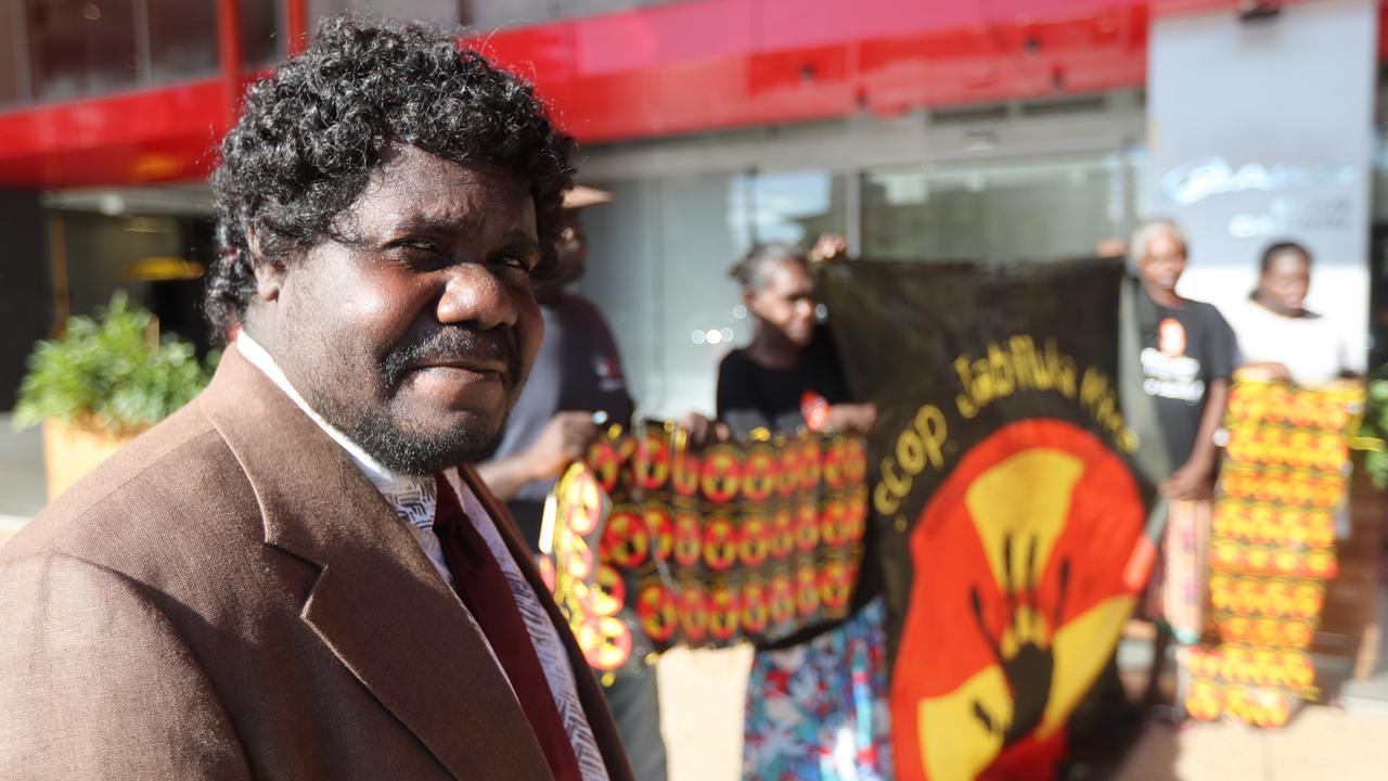 Corben Mudjandi alongside other Mirarr Traditional Owners held a protest outside the Energy Resources of Australia Annual General Meeting of shareholders at the Oaks Darwin Elan Hotel, Wood St over a proposed mine lease extension for Jabiluka. Picture: Zizi Averill